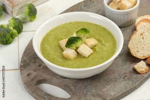 Brocolli Green Fresh Soup on White Table Top
