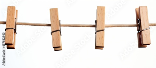 Wooden pegs on a rope holding nothing