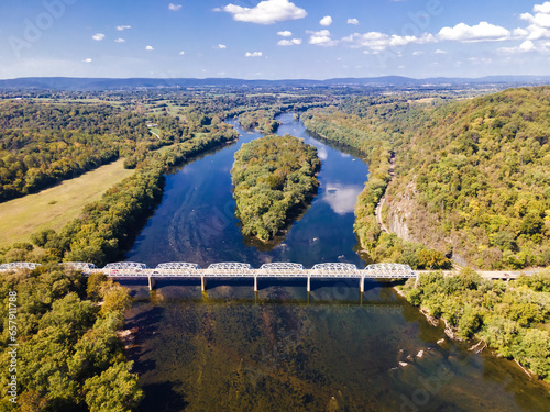 Landscape overlooking the forest and the Potomac River with a bridge on the border of the states of Maryland and Virginia. aerial photo