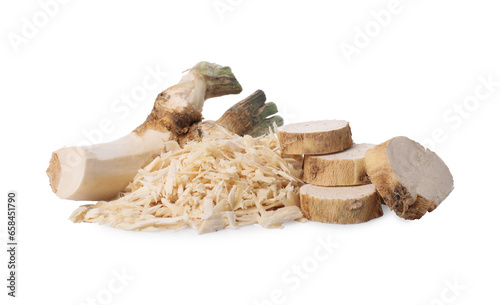 Grated and cut horseradish root isolated on white