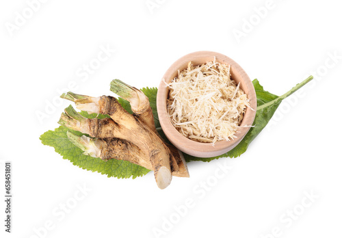 Grated and cut horseradish roots and leaf isolated on white, top view