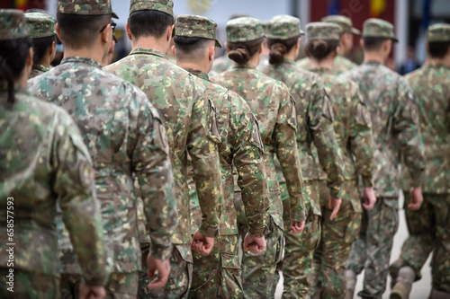 Soldiers in marching formation during military recruitment