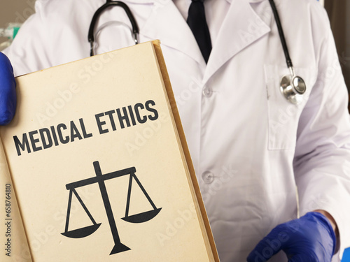 Medical Concept - Code of medical ethics is shown using the text