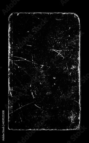 Old book cover with scratches and uneven edges on black background for overlay
