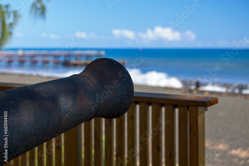 Old cannon by the beach in Saint-Paul de la Reunion