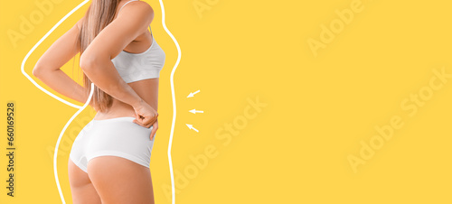 Slim young woman after weight loss on yellow background with space for text