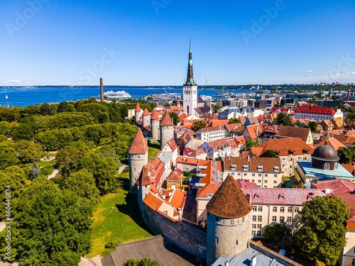 a scenic view of old city buildings and trees in tallinn