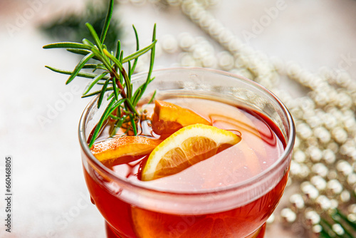 christmas mulled wine cocktail citrus and rosemary traditional drink new year holiday appetizer meal food snack on the table copy space food background rustic top view
