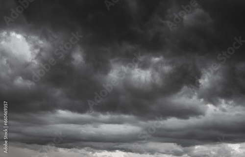 dark clouds make sky in black. Heavy rain thunderstorm. Pattern of clouds overcast predict tornado, Hurricane or thunderstorm and rainy. Dark sky cloudy have storm and lightning thunderbolt.