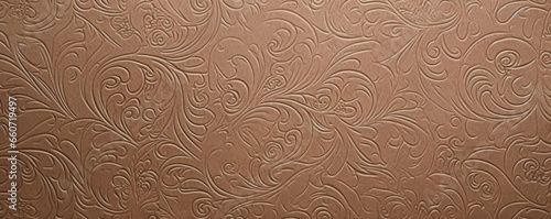Closeup of embossed Kraft paper This texture features a raised design that adds depth and dimension to the paper. The pattern can vary from simple lines to intricate designs, giving the