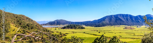 panoramic of the Tepetiltic volcano crater in Nayarit, mountains and green fields with mountains in the background