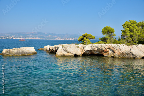 View of the wild rocky beach on Kefalonia, the largest of the Ionian island, Greece, Europe. Concept of tourism and travel.