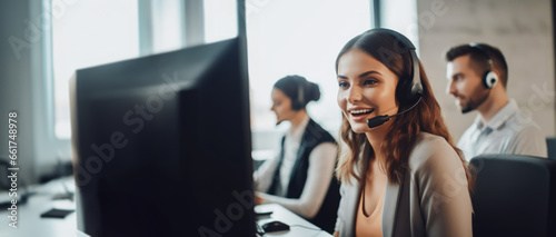 Female customer support, telemarketing and callcenter employee with headset talking on the phone. With copy space