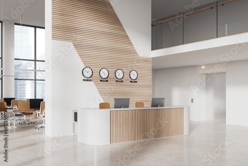 White and wooden office hall interior with reception and elevator