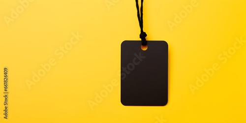 Price tags black color hangs on yellow background. Blank space for sale text. generative Ai