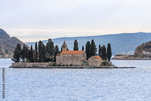 Strp, Montenegro - 27 january 2023 - View on the Catholic monastery of Saint George - (Manastiri Katolik i Shën Gjergjit) in the Bay of Kotor (Бока Которска)