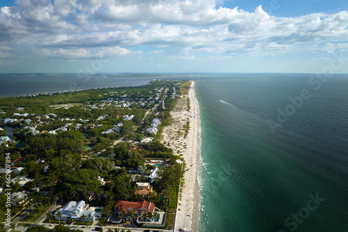 American waterfront houses in rural US suburbs. View from above of large residential homes in island small town Boca Grande on Gasparilla Island in southwest Florida
