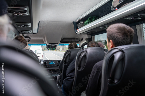 Travelers on a trip in a minibus in County Wicklow near Glendalough, Ireland