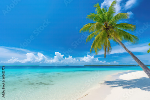 Beautiful And Natural Tropical Landscape Featuring Beach With White Sand And Palm Tree Leaning Over Calm Ocean Waves The Turquoise Ocean Is Set Against Blue Sky With Clouds