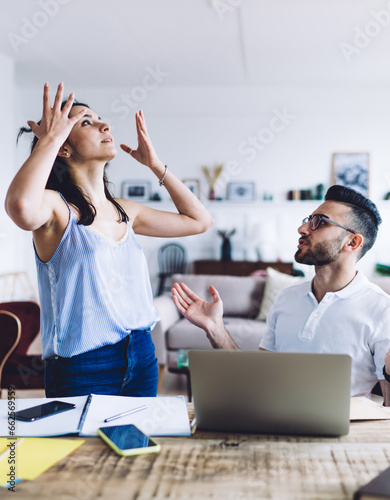 Business partners arguing and solving problem together at home