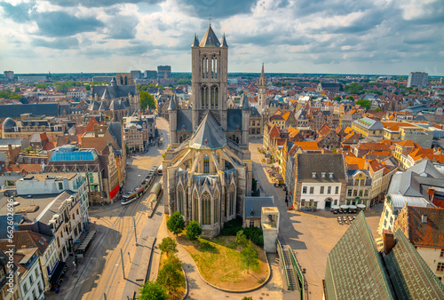 Skyline of Gent, Ghent in West Flanders, Belgium, seen from Belfort tower with St. Nicholas Church.