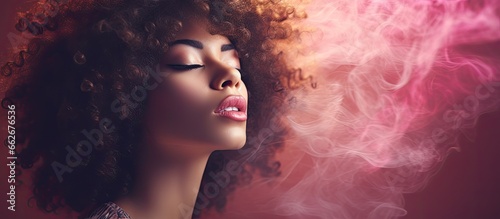 Blurred photo of a gorgeous woman with an afro blowing a kiss With copyspace for text