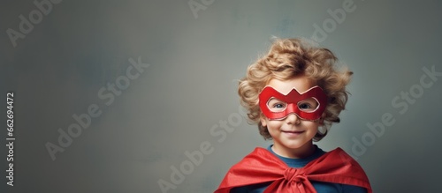 Kid playing superhero With copyspace for text
