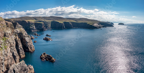 Aerial view of the cliffs near the lighthouse on the island of Arranmore in County Donegal, Ireland