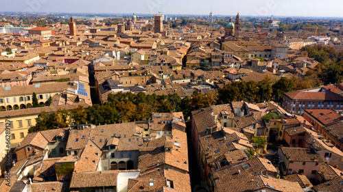 Aerial view of the historic center of Reggio Emilia, Italy. You can see the churches of the city and the typical roofs of medieval Italian architecture.