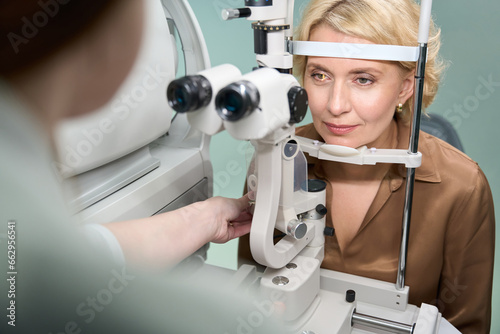 Elegant lady at an ophthalmologists appointment