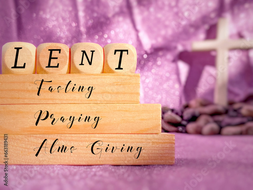 Lent Season,Holy Week and Good Friday concepts - Lent fasting praying alms giving text with purple background. Stock photo. 