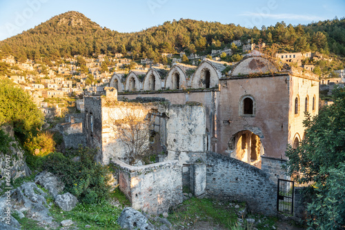 Ruined Taksiyarhis upper church of Kayakoy (Levissi) abandoned village near Fethiye in Mugla province of Turkey. The church dates from the 19th century. 