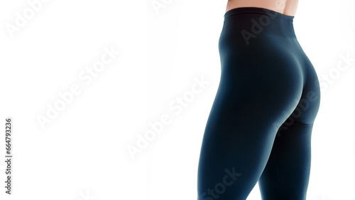 Close up view of sexual sporty tempting beautiful attractive nice round ass wearing tight leggings