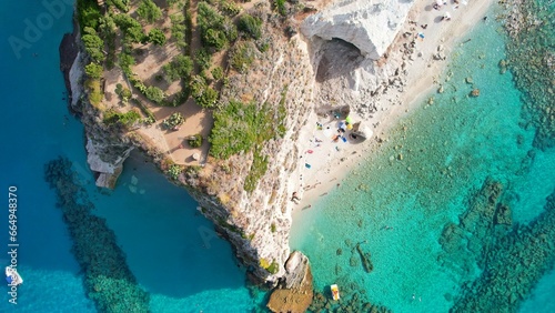 Tropea - Italy - gigantic aerial view vertically down from the steep rock on the beach