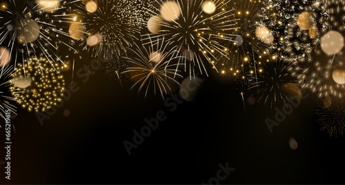 Gold fireworks background with bokeh. New Year background with space for text. Realistic fireworks isolated