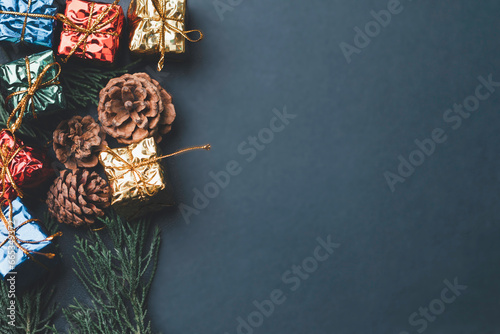 Christmas tree and gift box balls. Bokeh garlands in the blur silver golden background. Developing ideas for the new year 2024. festival of celebration happy.