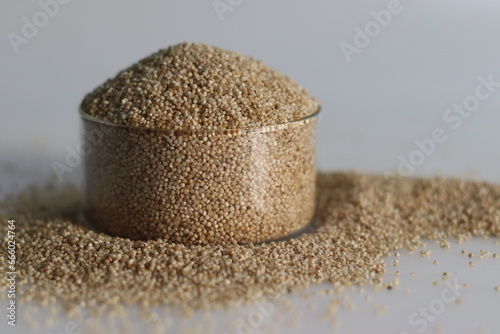 Closeup of banyard millet, a healthy grain, in a glass bowl filled to the brim