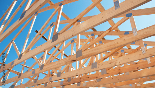 Timber framing, wooden structural framework. Wooden framework during house roofing construction.