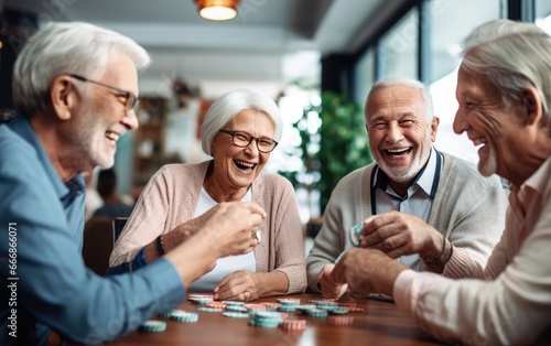 Group of seniors playing cards and sharing laughter in a retirement nursing home