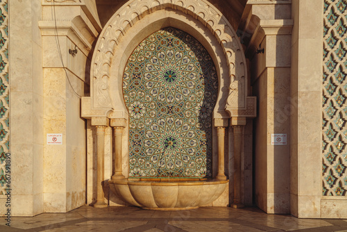 Hassan II Mosque fountain made of mosaic tile work , Detail of Hassan II Mosque at sunset in Casablanca, Morocco
