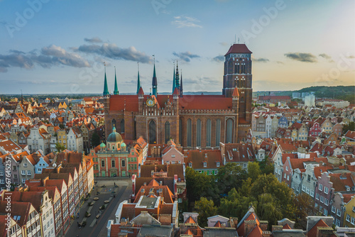 A magical image of Gdańsk at sunset. Urban landscape. Beautiful Main Town with old tenement houses. 