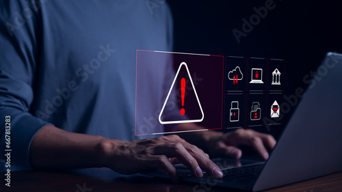 Cyber security warning alert system concept. Businessman working on laptop. Computer network hack, crime and virus, Malicious software, compromised information, illegal connection, data vulnerability,