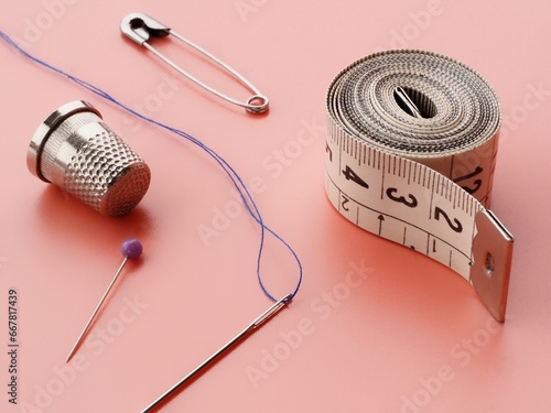 sewing and tailoring tools Pink background