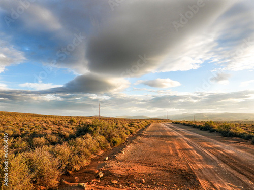 Quiet sand road through the farmlands of Sutherland, Northern Cape