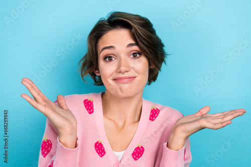 Portrait of lovely pretty cute girl wear trendy pattern clothes show arms palms gesture no answer sorry isolated on blue color background