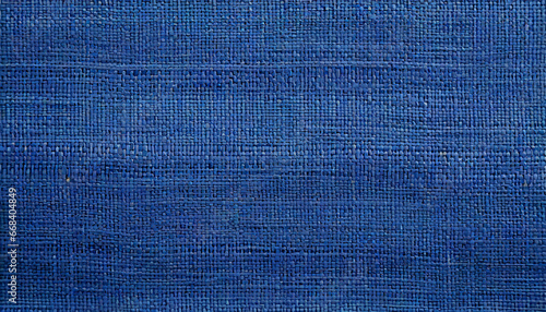 close up texture of natural weave cloth in dark blue or teal color fabric texture of natural cotton or linen textile material seamless background