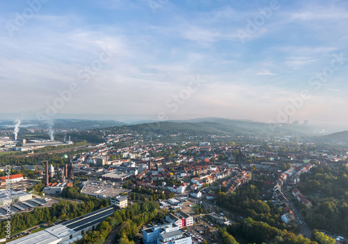 Autumn cityscape of Neunkirchen, Saarland, Germany. Wide aerial landscape panorama at sunrise.