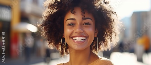 beautiful african american woman with afro hairstyle in city