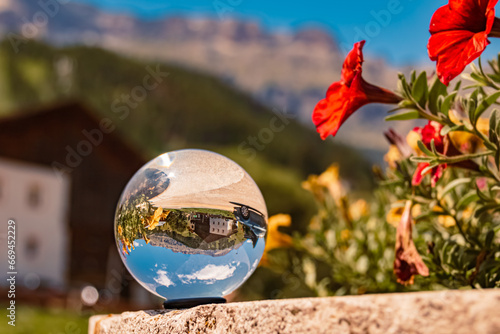 Crystal ball alpine summer landscape shot at Arabba, Livinallongo del Col di Lana, Belluno, Veneto, Italy