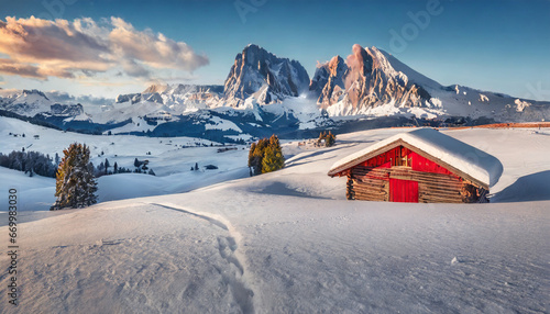 christmas postcard with red chalet perfect winter view of alpe di siusi village with plattkofel peak on background exciting morning view of dolomite alps wonderful outdoor scene of ityaly europe